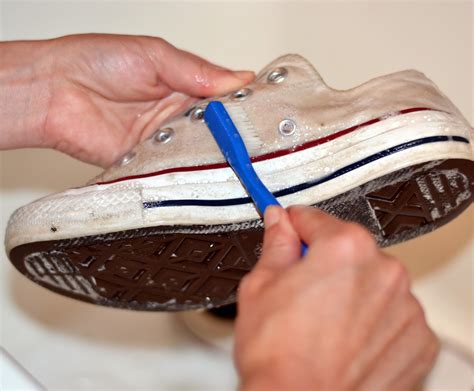 cleaning white canvas sneakers.